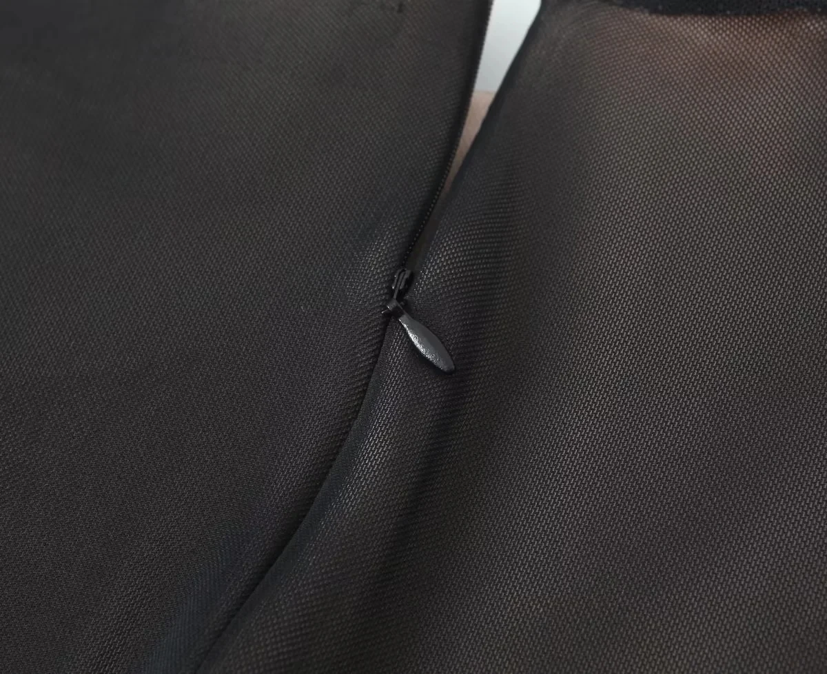 Schwarzer Netz-Bodysuit mit Rüschen und Stehkragen 35 4181628947